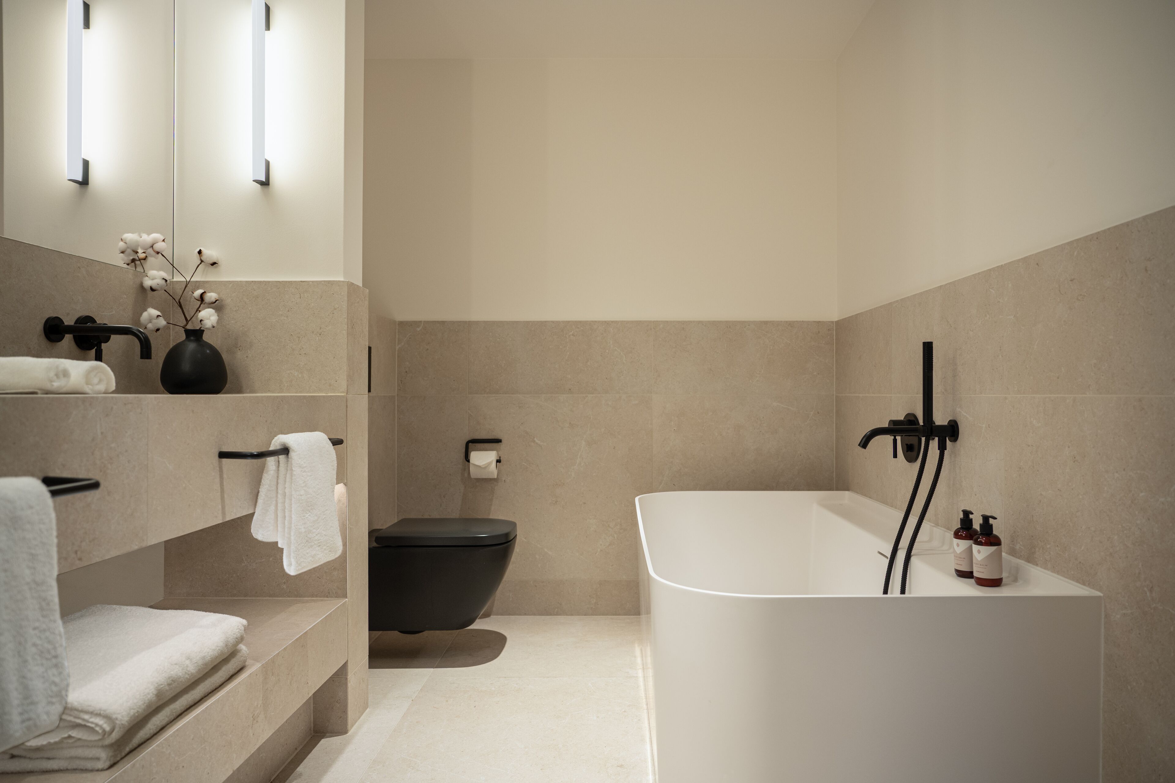 Shower, designer toiletries, hair dryer, bathrobes