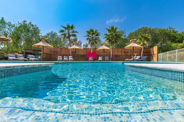 Seasonal outdoor pool, pool umbrellas, pool loungers