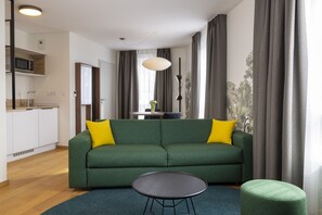 Appartement Familiale | Sengetøy av topp kvalitet, minibar og safe på rommet