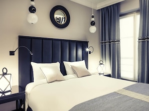 Ropa de cama de alta calidad y minibar