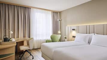 Premium bedding, pillow-top beds, in-room safe, desk