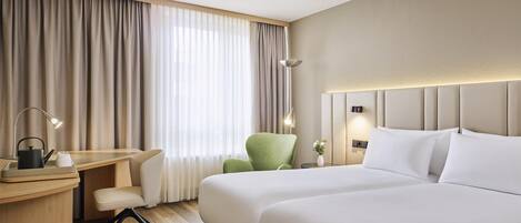 Premium bedding, pillow-top beds, in-room safe, desk