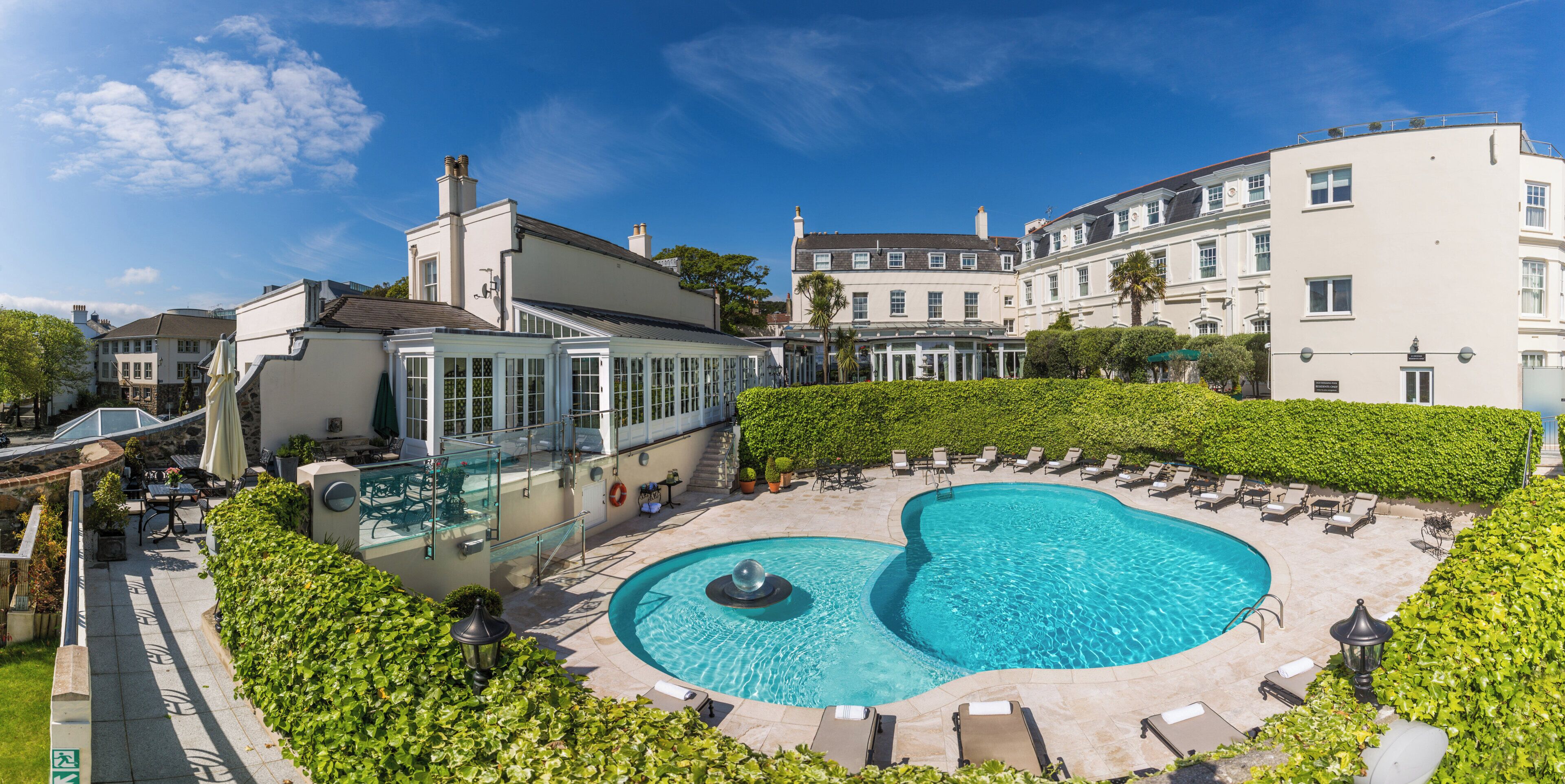 Seasonal outdoor pool, pool umbrellas, pool loungers