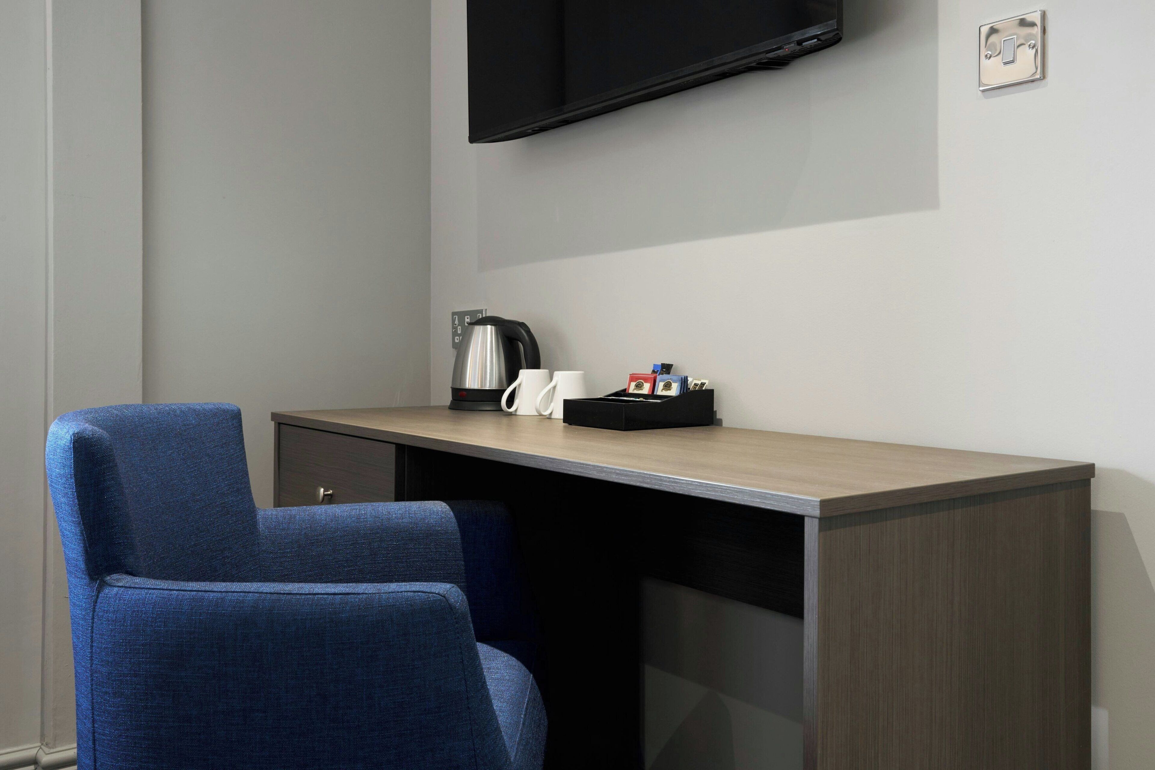 Hypo-allergenic bedding, desk, laptop workspace, iron/ironing board