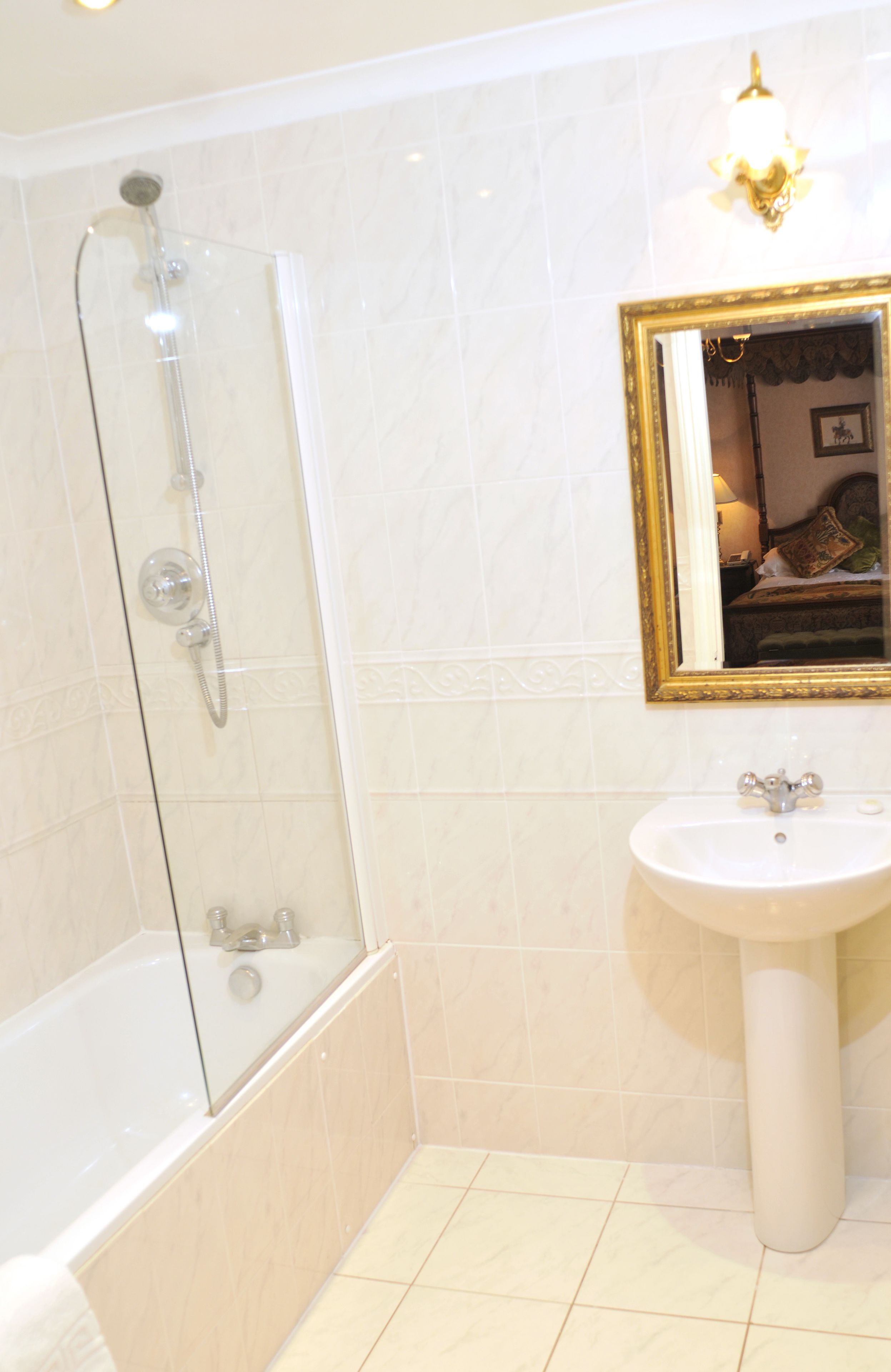 bathtub, free toiletries, hair dryer, towels