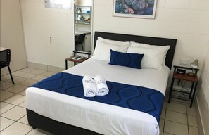 Premium bedding, minibar, blackout drapes, iron/ironing board