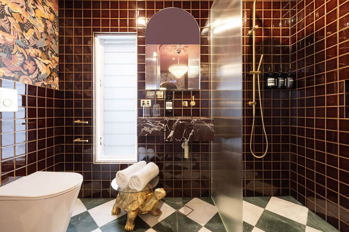 velvet suite | bathroom | designer toiletries, hair dryer, towels, soap