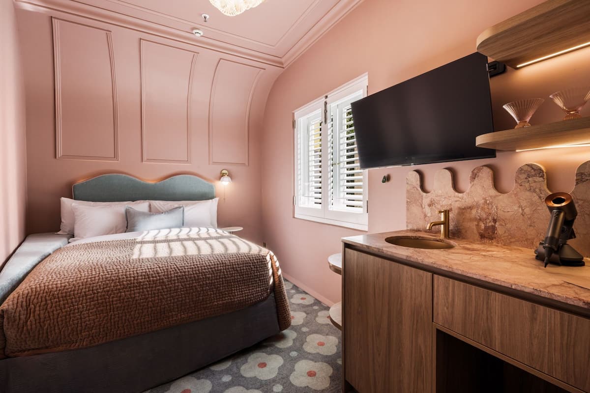 Petite Double Room | Private kitchen | Coffee/tea maker, mini-fridge, microwave, eco-friendly cleaning products