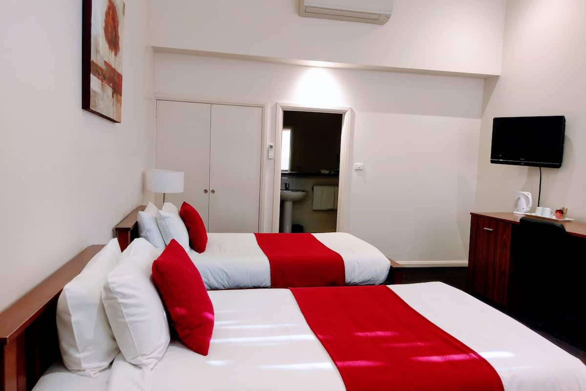 Standard Twin Room | Individually furnished, iron/ironing board, free WiFi, bed sheets