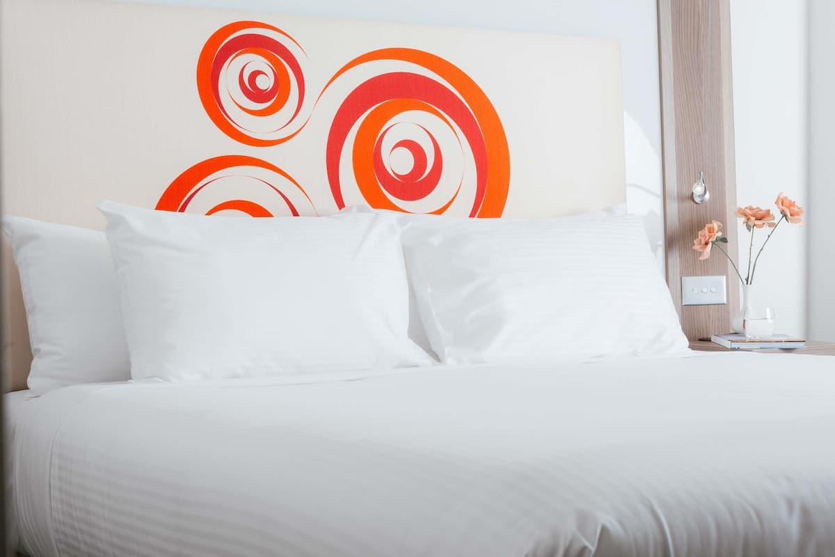 Suite, 1 King Bed with Sofa bed | Premium bedding, in-room safe, desk, blackout curtains