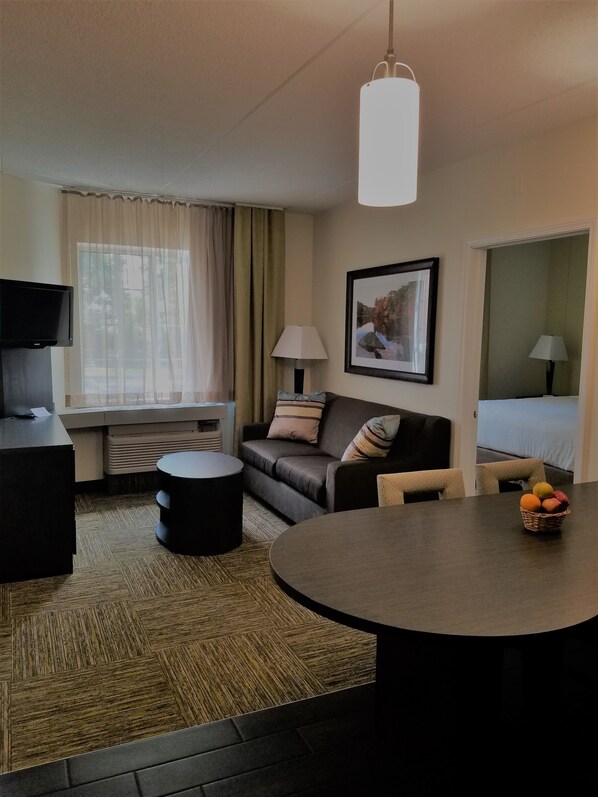 Suite, 2 Bedrooms (2 King bed & 1 sofa bed) | Living room | 32-inch flat-screen TV with cable channels, TV, DVD player