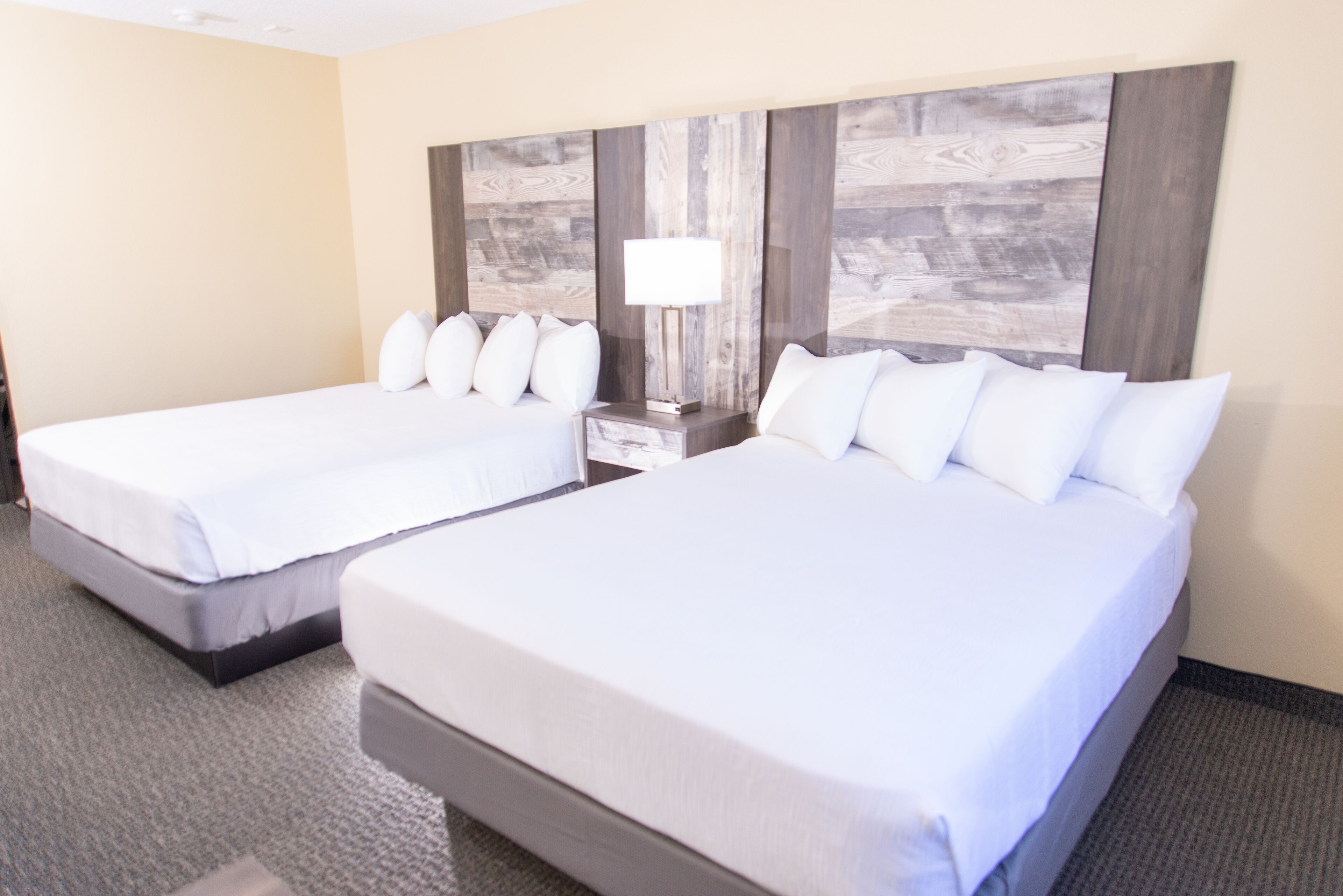 standard room, 2 queen beds | pillow-top beds, iron/ironing board, free cots/infant beds