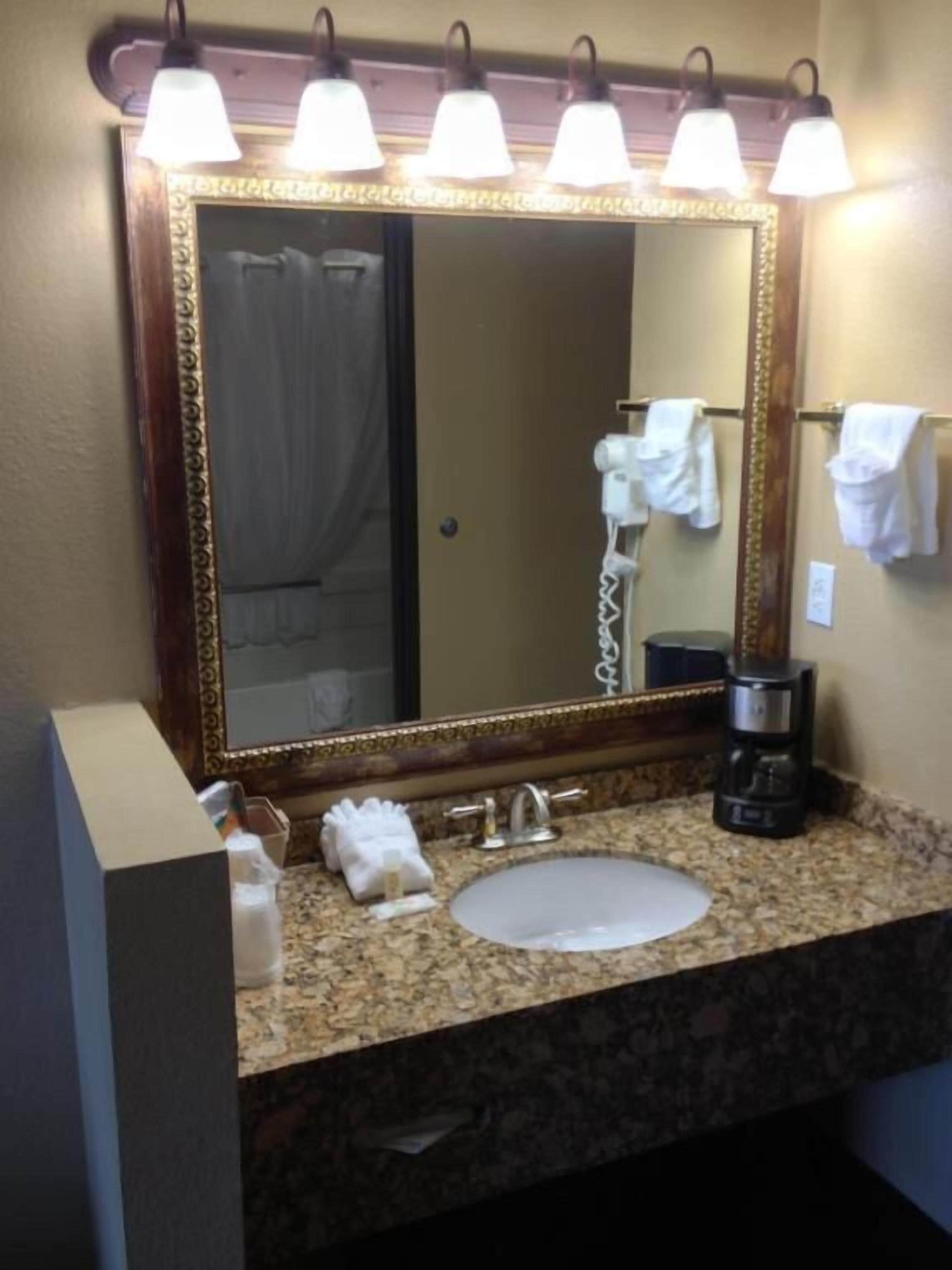 standard room, 2 queen beds | bathroom | free toiletries, hair dryer, towels