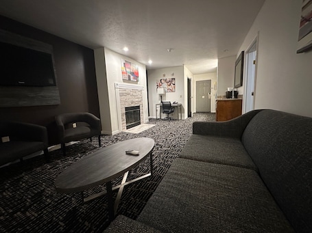 Suite, 1 King Bed, Non Smoking (with Sofabed) | 1 bedroom, iron/ironing board, rollaway beds, bed sheets