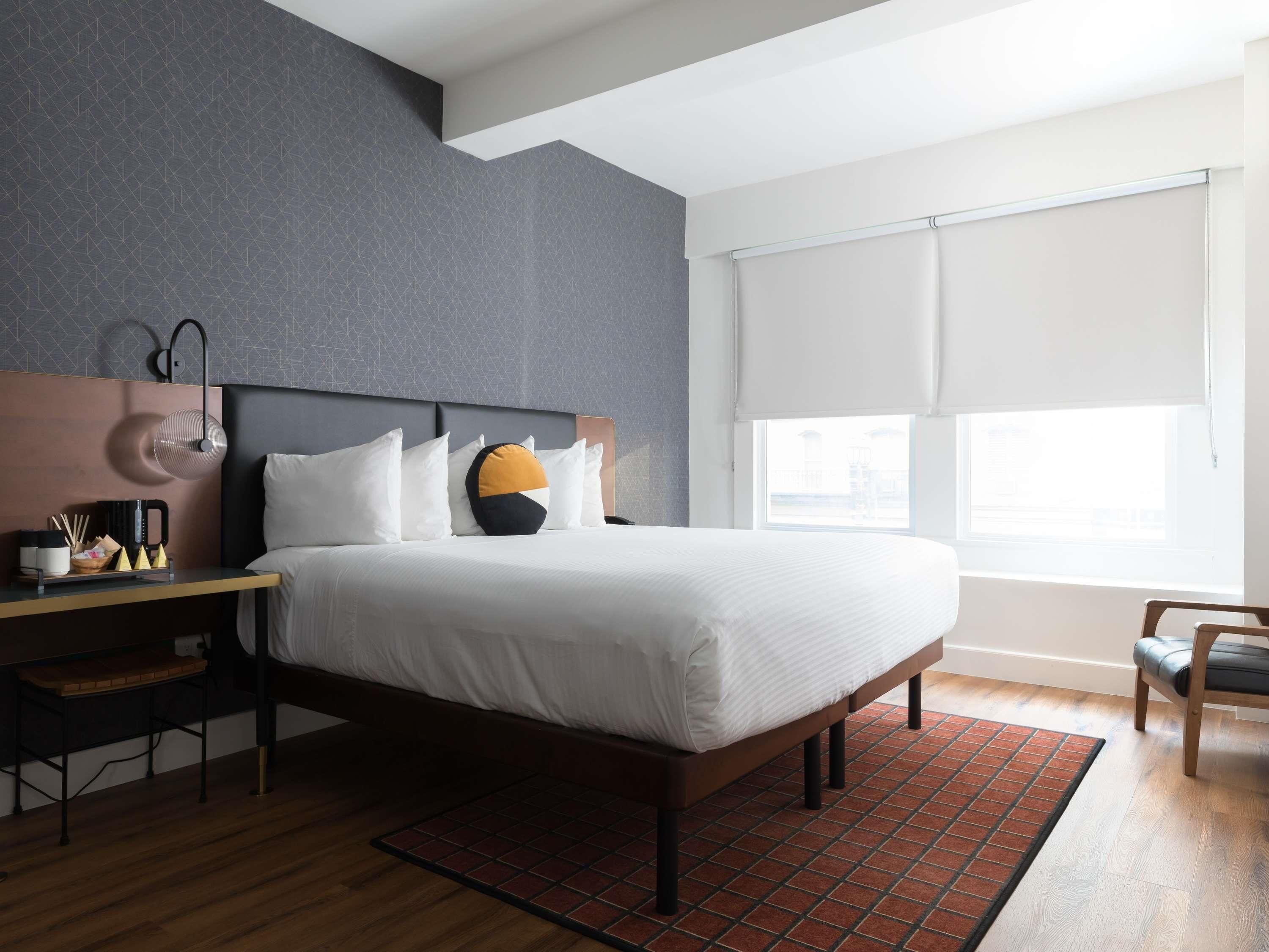 Deluxe Room, 1 King Bed, Accessible | Desk, laptop workspace, iron/ironing board, free WiFi