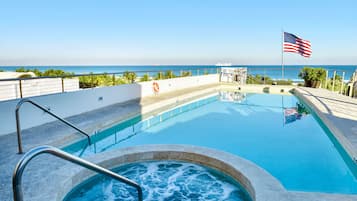 Outdoor pool, open 7:00 AM to 7:00 PM, pool umbrellas, sun loungers