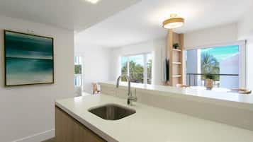 Coffee/tea maker, fridge, microwave, dining tables