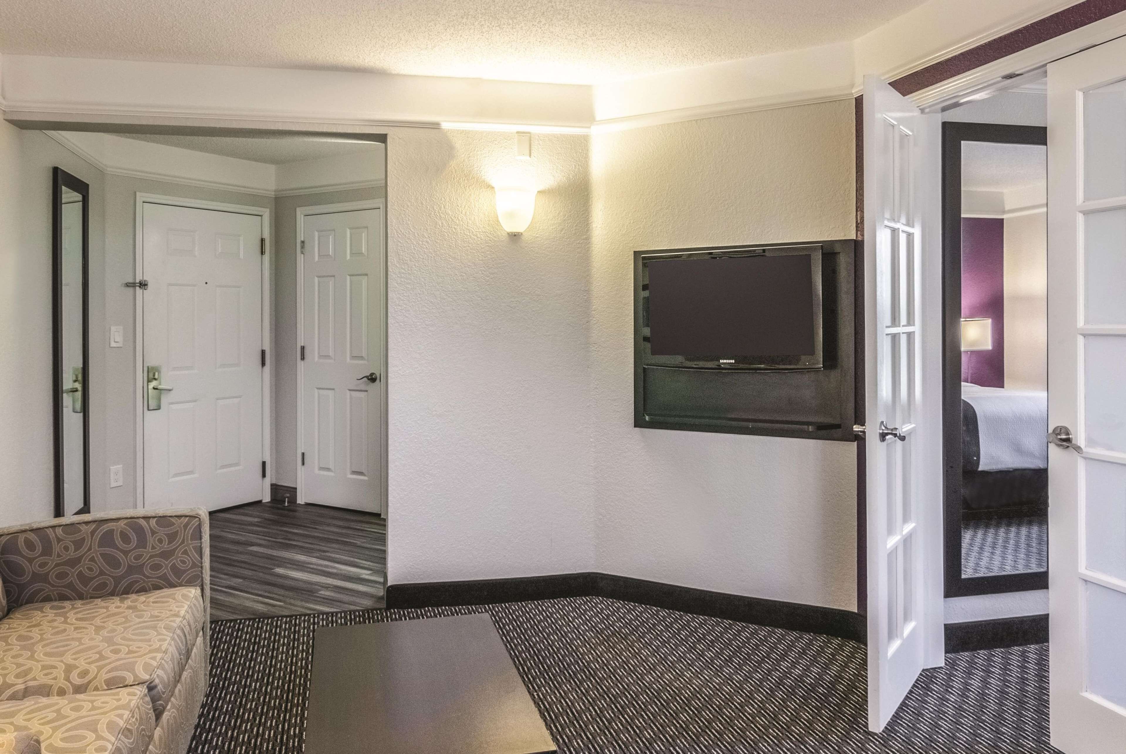 suite, 1 king bed, non smoking | premium bedding, desk, iron/ironing board, free cots/infant beds