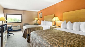 A hotel room with two beds, a desk, a chair, and a window. - Best Western Paducah Inn (Paducah)