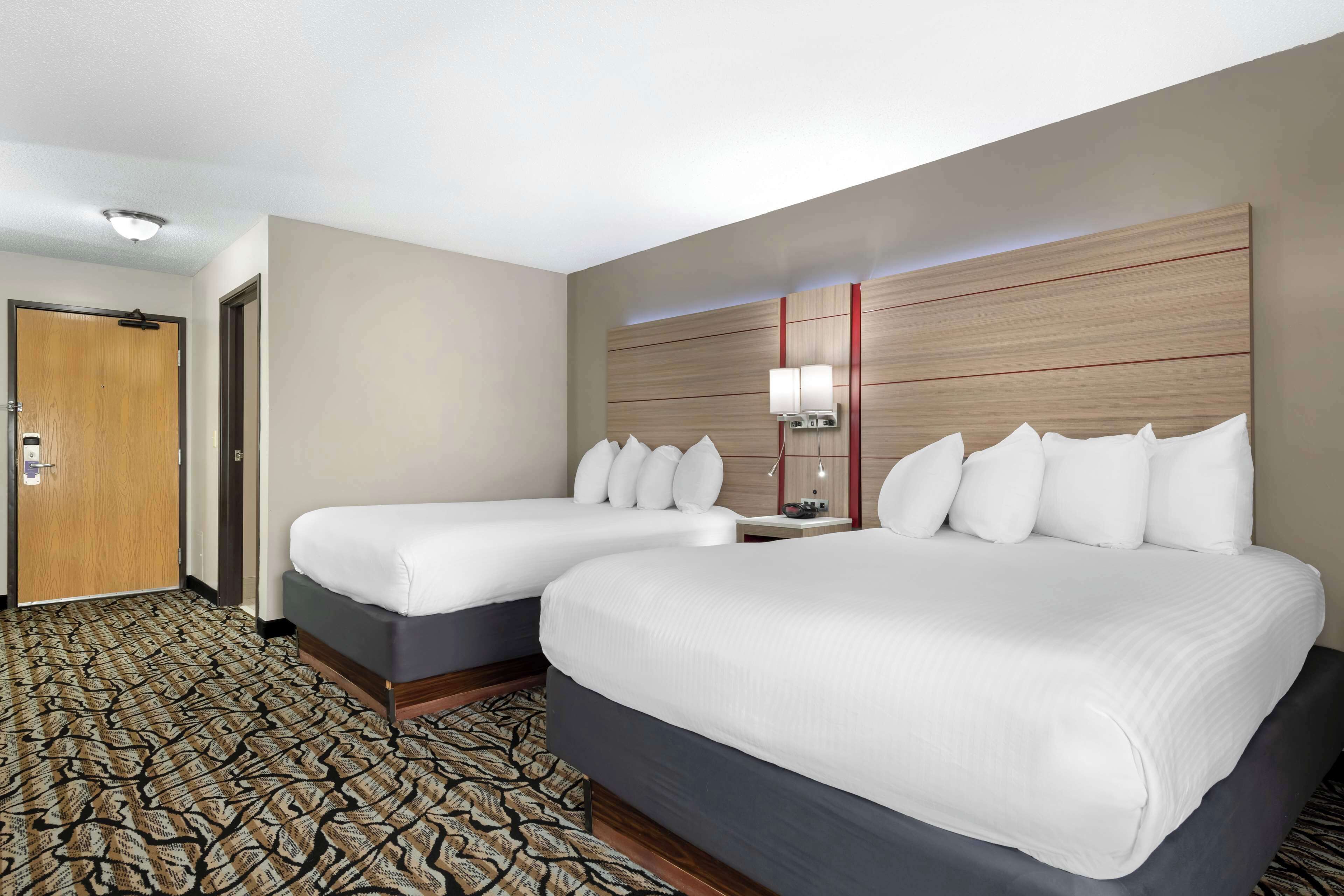 standard room, 2 queen beds, non smoking, refrigerator & microwave | pillow-top beds, laptop workspace, iron/ironing board