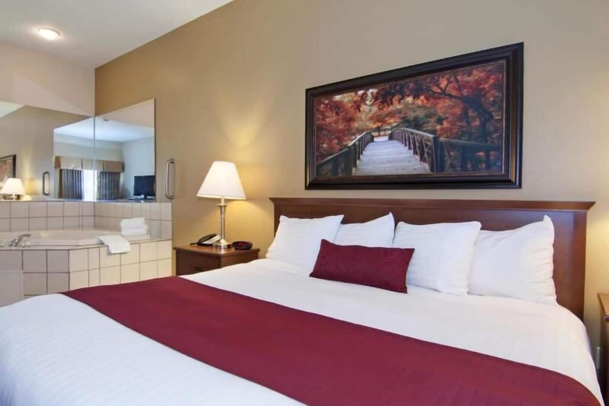 Pillowtop beds, laptop workspace, iron/ironing board