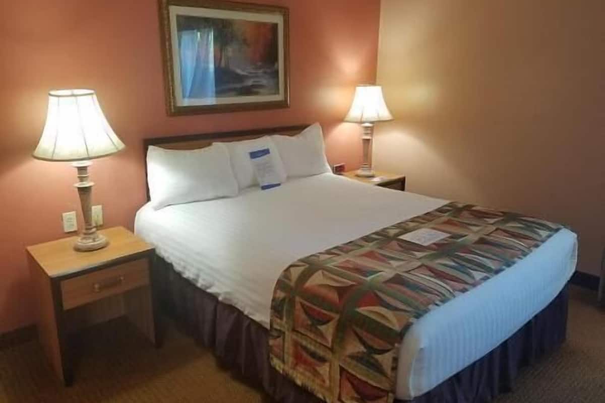 In-room safe, desk, laptop workspace, blackout curtains