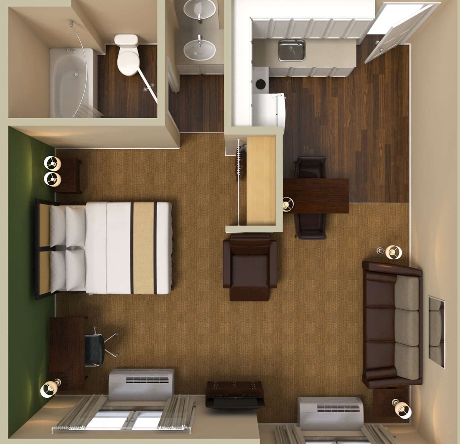 A compact hotel room with a bed, a desk, a chair, a wardrobe, a small bathroom with a toilet and sink, and a shower.