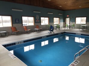 Indoor pool, open 6:00 AM to 9:00 PM, pool loungers