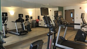 A gym with treadmills, elliptical machines, and a stationary bike. - Holiday Inn Express Mt Vernon by IHG (Mount Vernon)