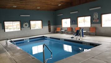 Indoor pool, open 6:00 AM to 9:00 PM, pool loungers