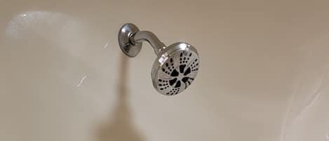 A bathroom sink with a chrome faucet and a single-handle design.