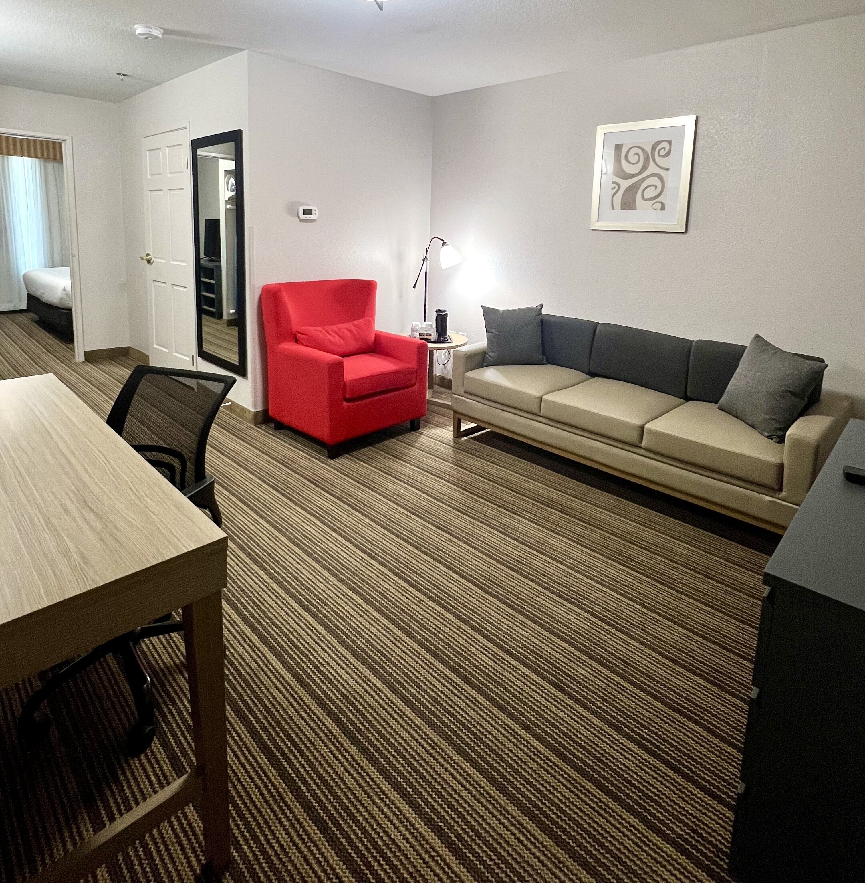 suite, 1 bedroom, non smoking | living area | 45-inch led tv with satellite channels, tv
