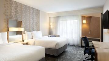 Hypoallergeen beddengoed, een kluis op de kamer, een bureau