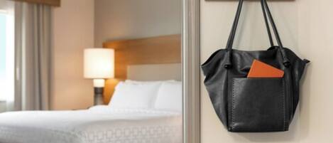 Desk, laptop workspace, blackout drapes, iron/ironing board