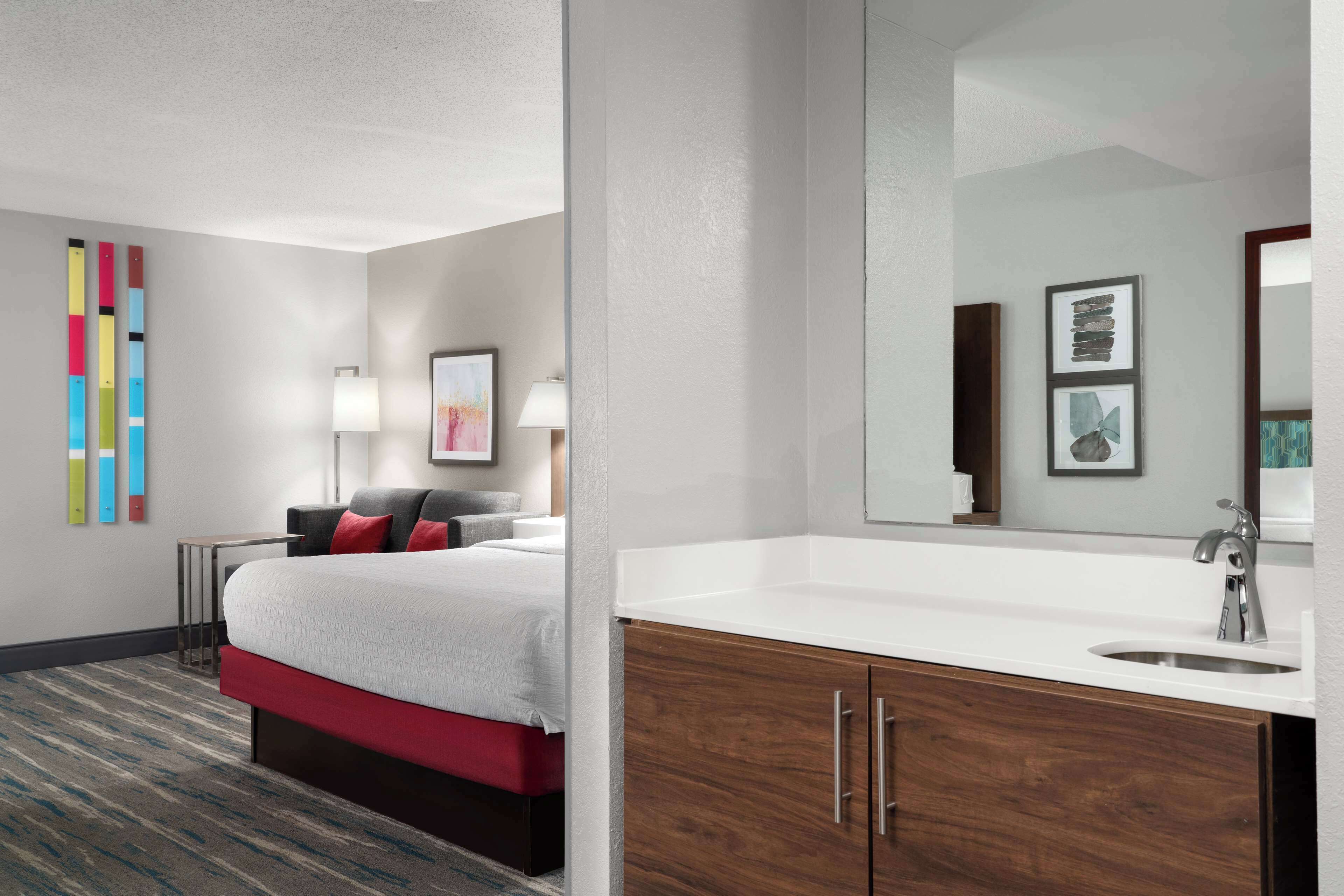 deluxe room, 1 king bed | living area | 55-inch led tv with cable channels, tv