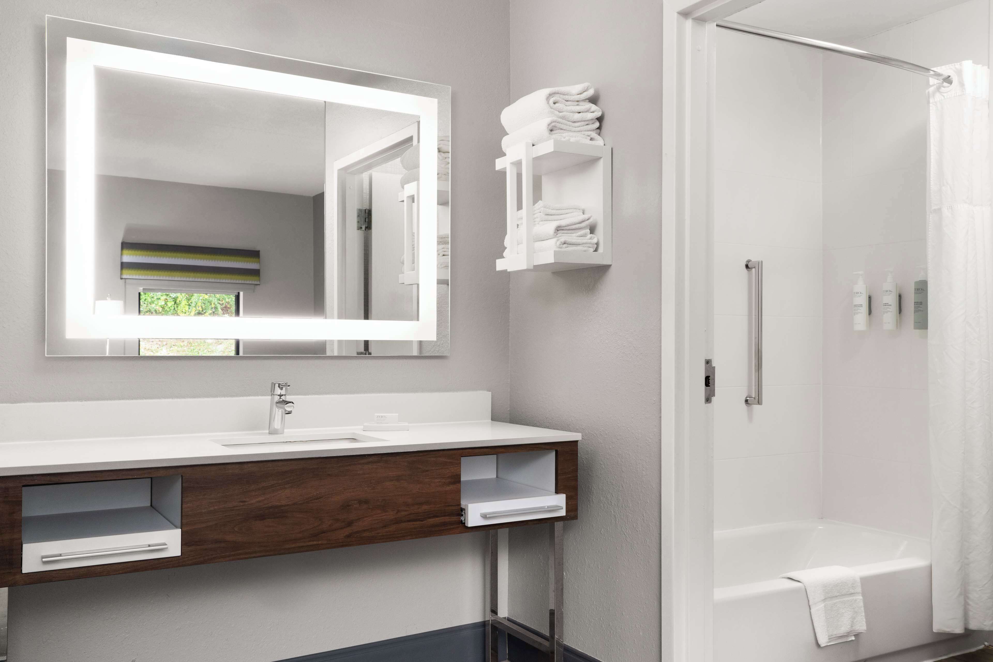 studio, 2 queen beds | bathroom | free toiletries, hair dryer, towels