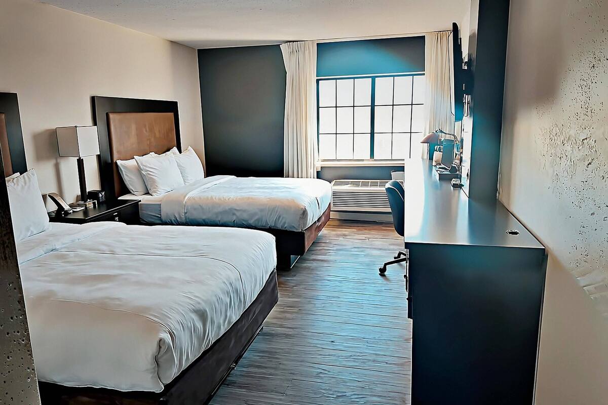 Standard Room, 2 Queen Beds, Non Smoking | Pillowtop beds, desk, iron/ironing board, free cribs/infant beds