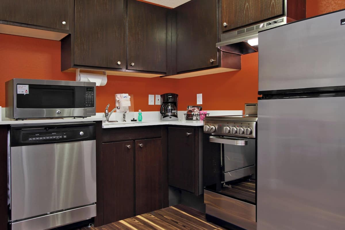 desk, laptop workspace, blackout curtains, iron/ironing board