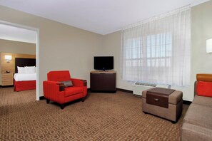 Desk, laptop workspace, blackout drapes, iron/ironing board