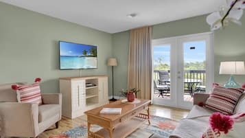 Premium Condo, 2 Bedrooms | Living area | Flat-screen TV, DVD player