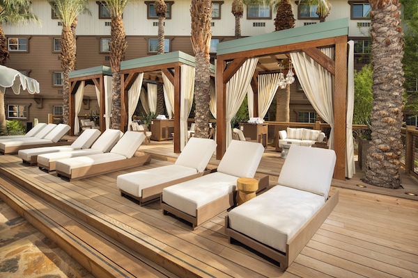 Outdoor pool, open 9:00 AM to 9:00 PM, cabanas (surcharge)
