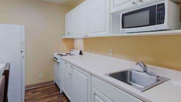 Individually furnished, desk, laptop workspace, iron/ironing board
