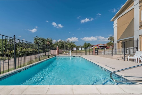Seasonal outdoor pool, open 10:00 AM to 10:00 PM, sun loungers