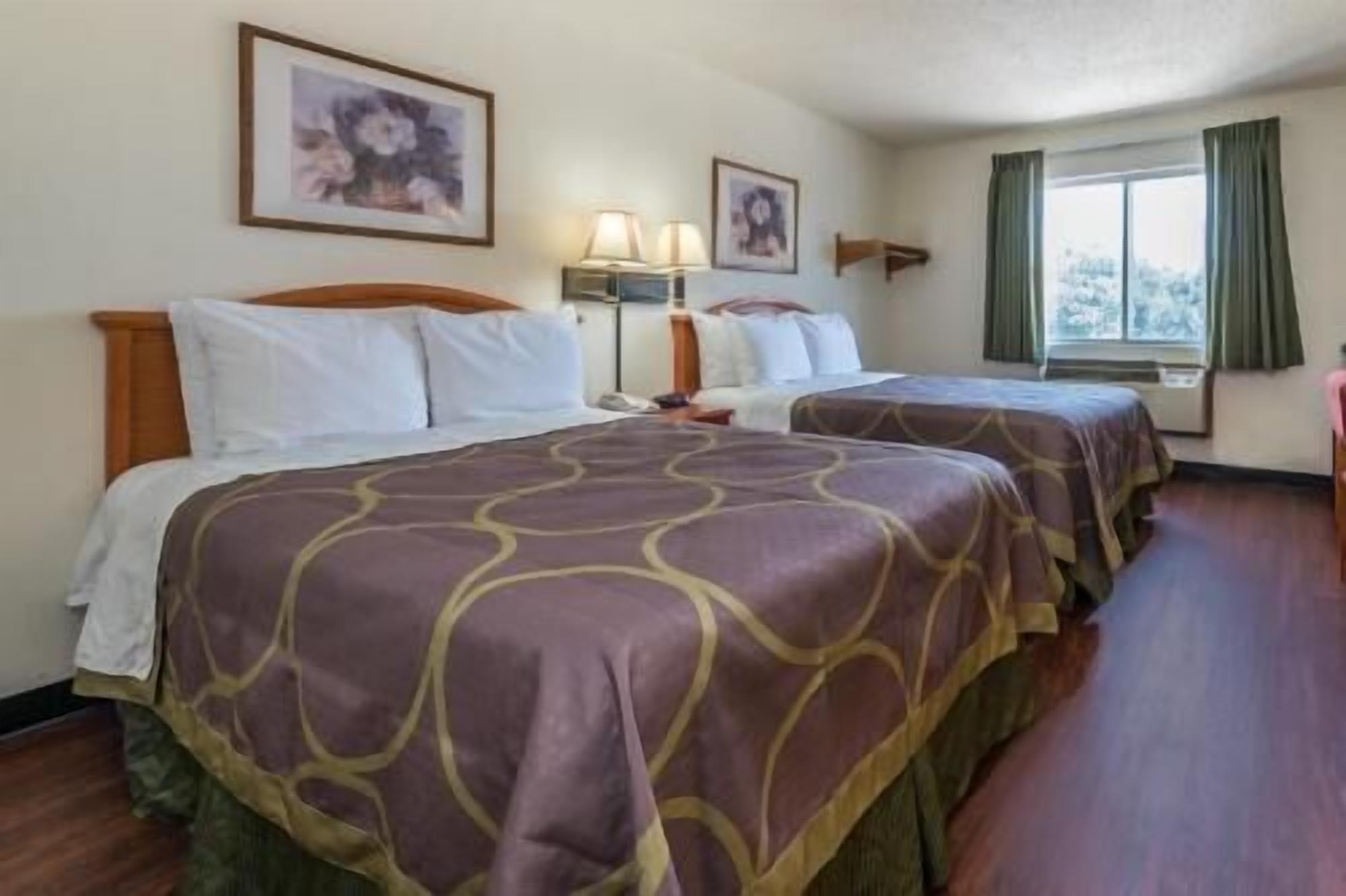 Desk, laptop workspace, blackout curtains, free WiFi