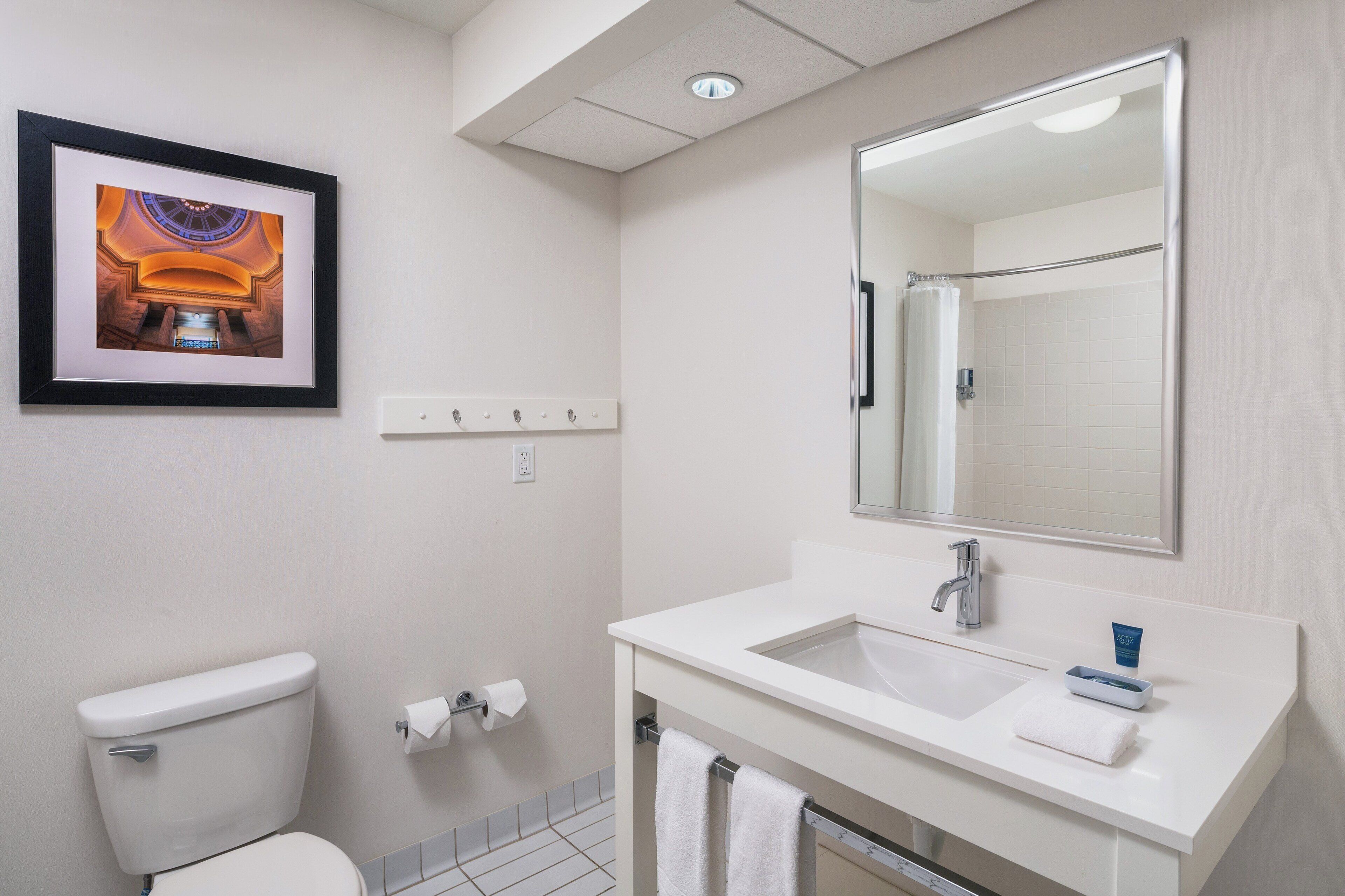 combined shower/bathtub, free toiletries, hair dryer, towels