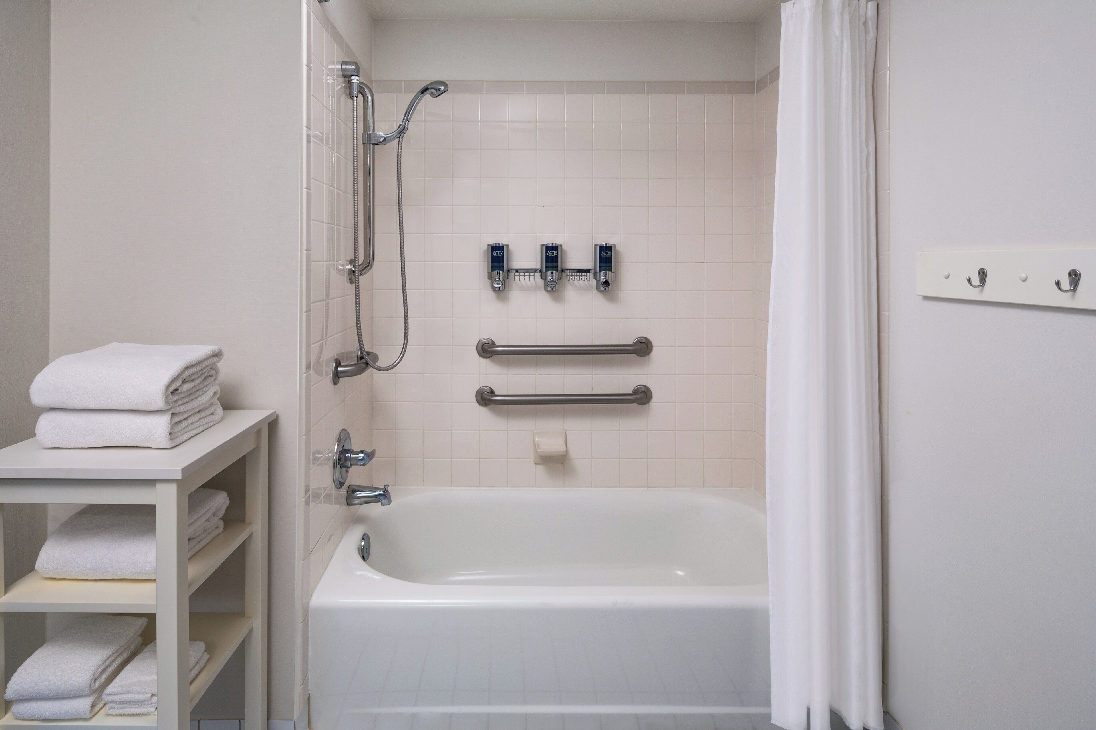 combined shower/bathtub, free toiletries, hair dryer, towels