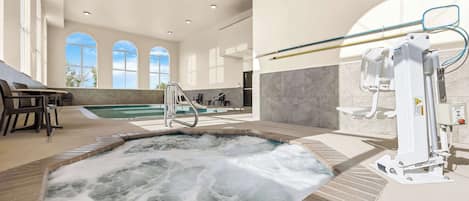 Indoor pool, open 8:00 AM to 11:00 PM, pool loungers