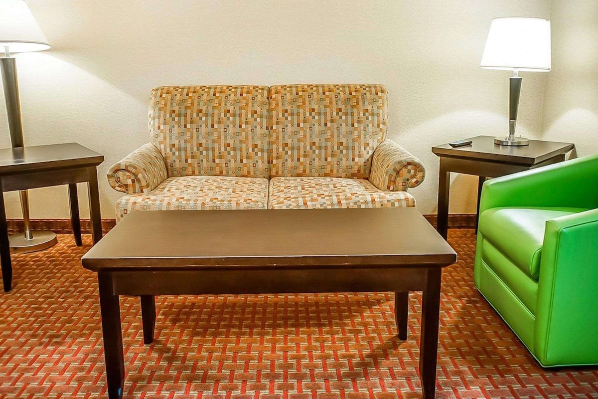 suite, 1 king bed, non smoking | in-room safe, iron/ironing board, free wifi, alarm clocks