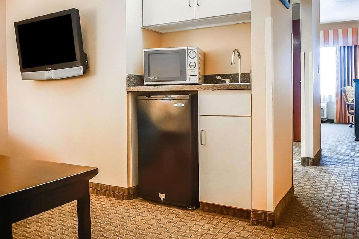 suite, 2 queen beds, non smoking | in-room safe, iron/ironing board, free wifi, alarm clocks