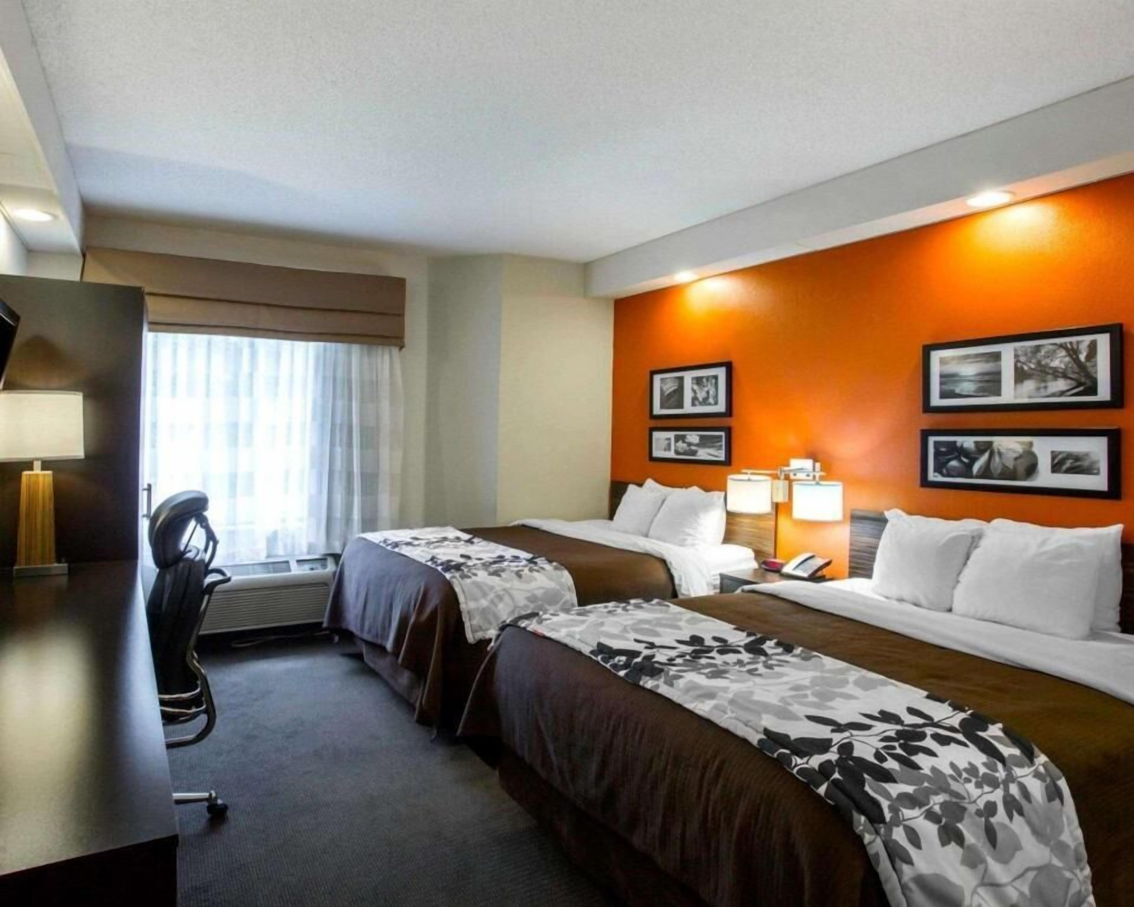 Premium bedding, pillowtop beds, desk, laptop workspace